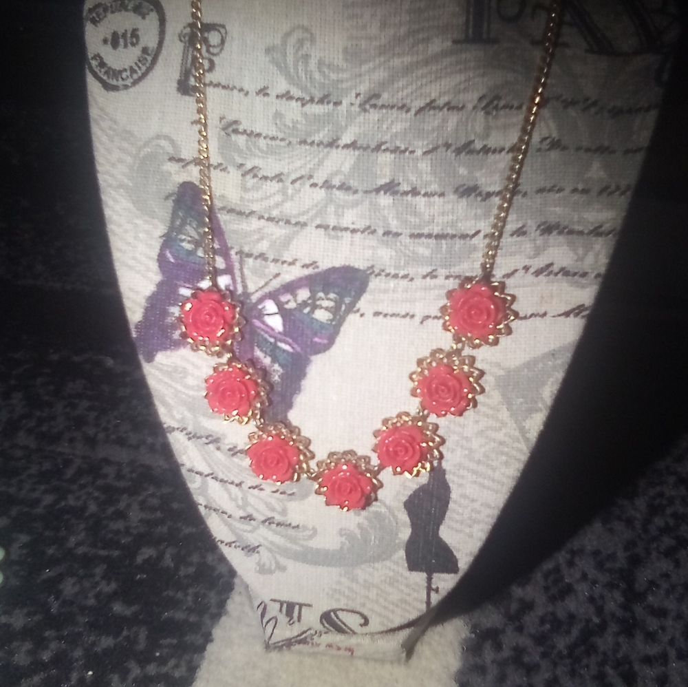 Coral colored rose necklace